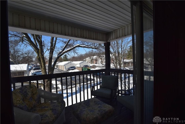 view of snow covered deck