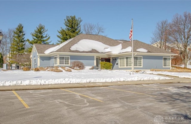 view of snow covered property