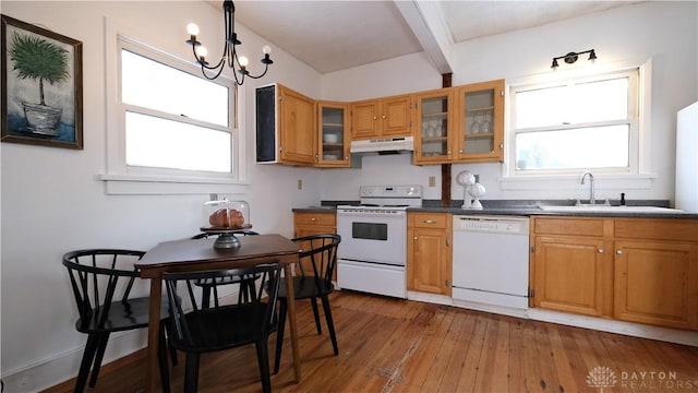 kitchen with white appliances, sink, light hardwood / wood-style flooring, a notable chandelier, and beamed ceiling