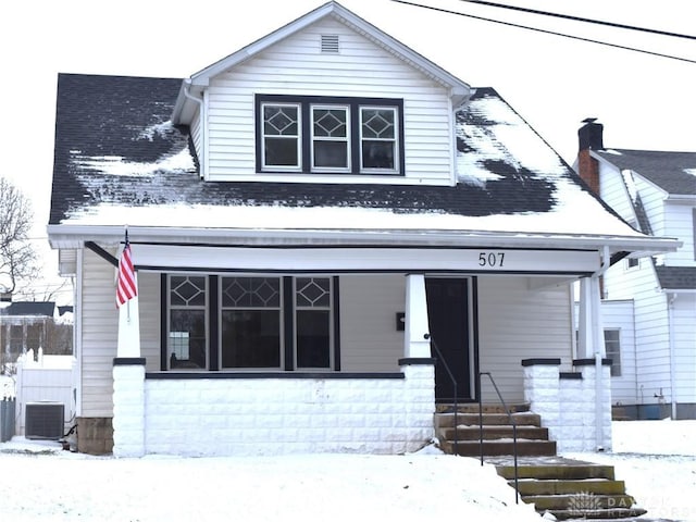 view of front facade with cooling unit