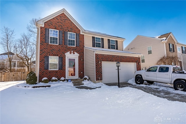 view of front of property with a garage