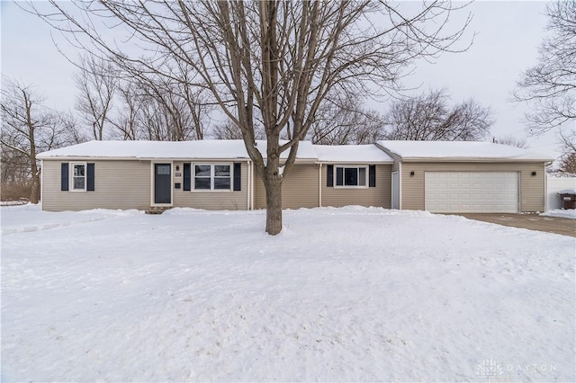 single story home featuring a garage