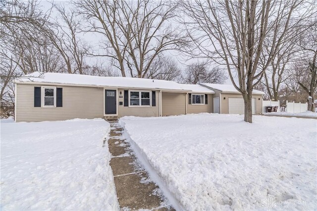 ranch-style home with a garage