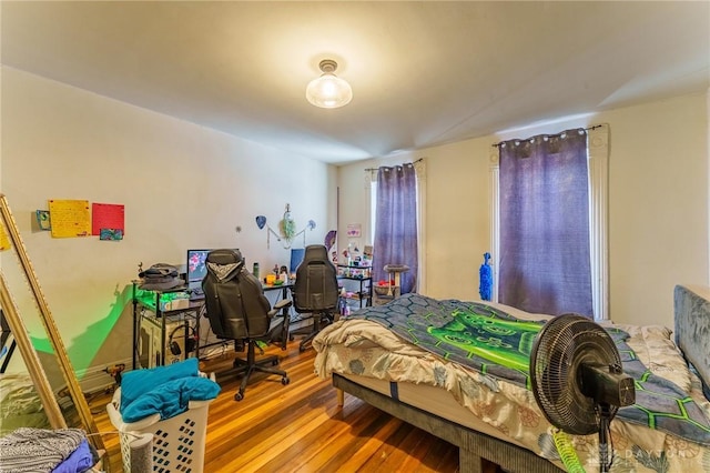 bedroom featuring hardwood / wood-style flooring