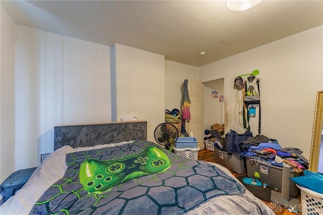 bedroom featuring hardwood / wood-style floors