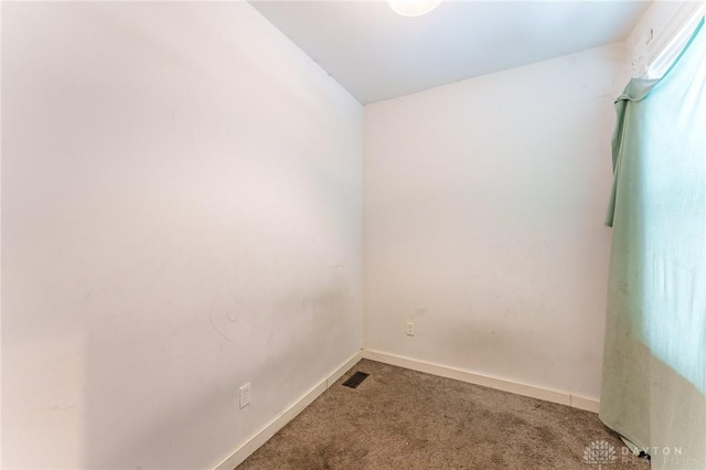 spare room with carpet floors