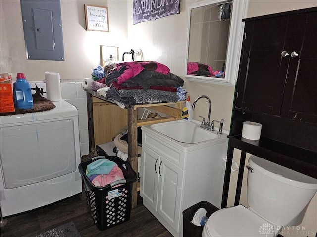 laundry area featuring washer / dryer, electric panel, dark wood-type flooring, and sink