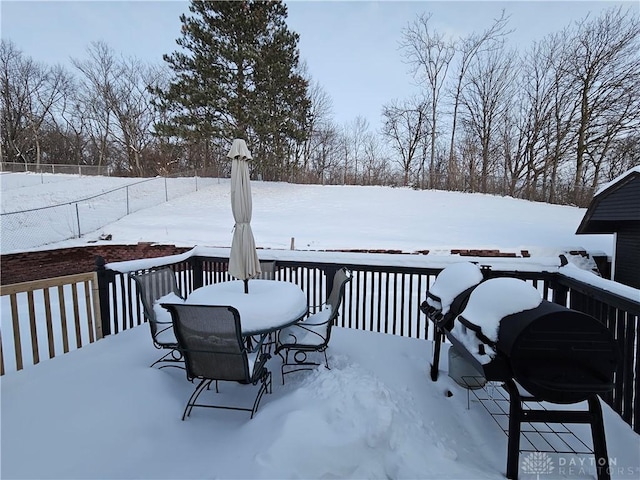 view of snow covered deck