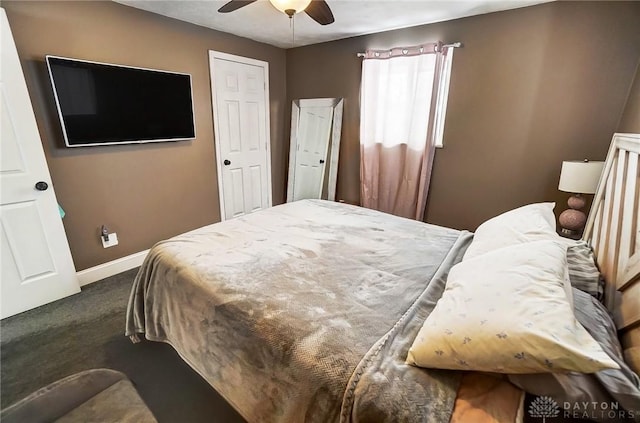 carpeted bedroom featuring ceiling fan