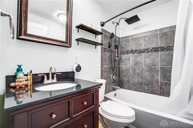 full bathroom featuring vanity, shower / tub combo, and toilet