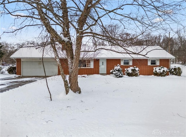 single story home featuring a garage