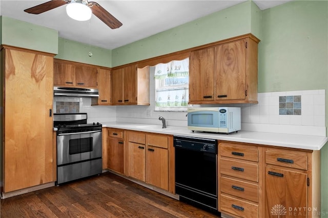 kitchen with decorative backsplash, ceiling fan, dark wood-type flooring, stainless steel range oven, and dishwasher