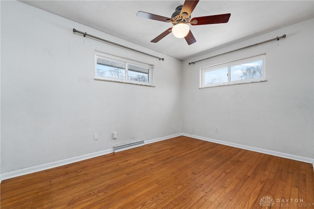 unfurnished room featuring ceiling fan and wood-type flooring