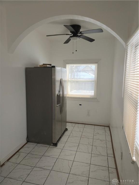 laundry room featuring ceiling fan