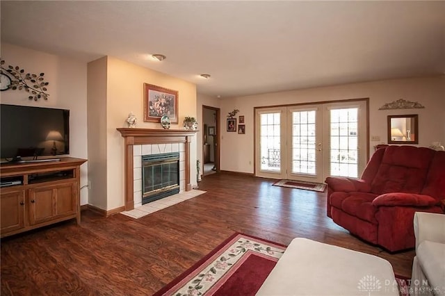 living room featuring hardwood / wood-style flooring and a fireplace