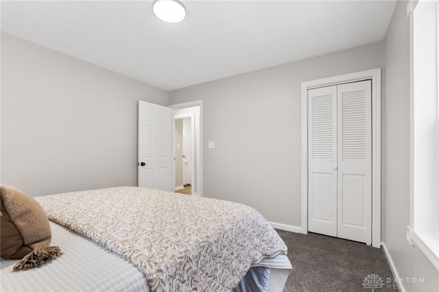 bedroom featuring dark carpet and a closet