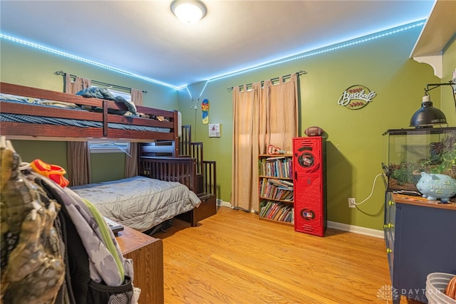 bedroom featuring wood-type flooring