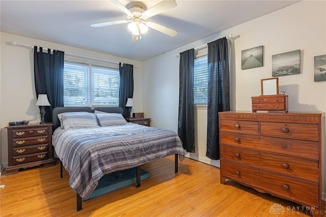 bedroom featuring ceiling fan and light wood-type flooring