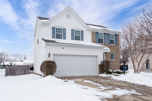 view of front of property with a garage