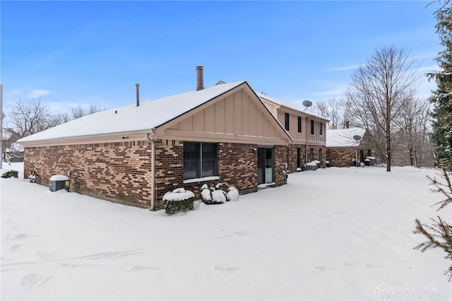 view of snow covered property