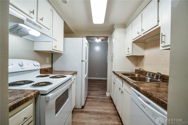 kitchen featuring white cabinets, white appliances, ceiling fan, and sink