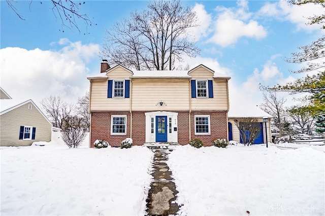 front of property with a garage