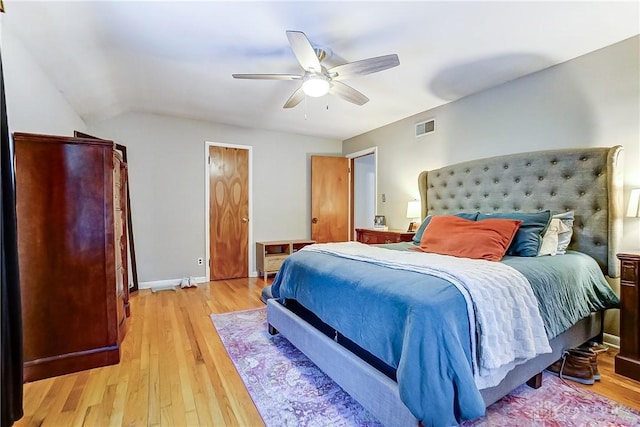 bedroom with ceiling fan and light wood-type flooring