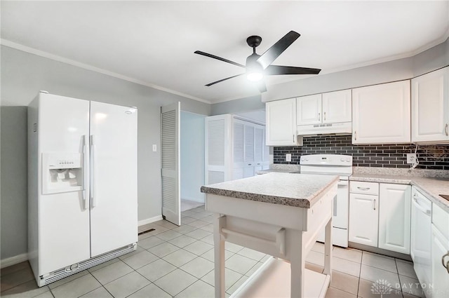 kitchen featuring white cabinets, ceiling fan, a kitchen island, and white appliances