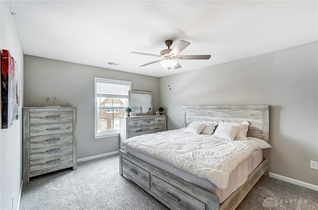 carpeted bedroom with ceiling fan