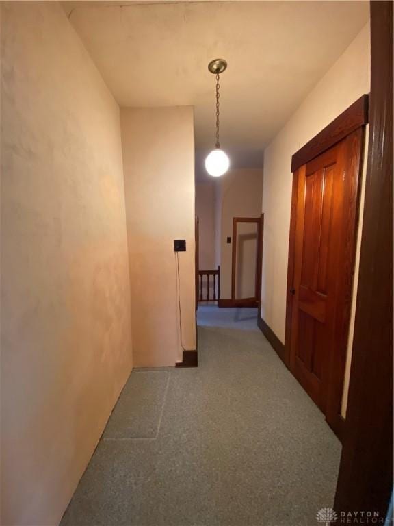 corridor with carpet floors