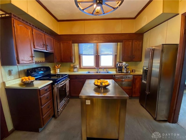 kitchen with stainless steel appliances, a kitchen island, crown molding, and sink