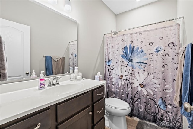 1189 Heathgate Way, Fairborn, OH 45324 - full bath featuring toilet, curtained shower, wood finished floors, and vanity