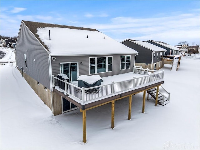 1189 Heathgate Way, Fairborn, OH 45324 - snow covered property featuring a wooden deck and stairs