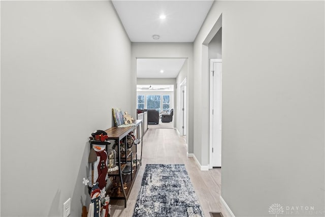 1189 Heathgate Way, Fairborn, OH 45324 - hallway with baseboards, light wood finished floors, and recessed lighting