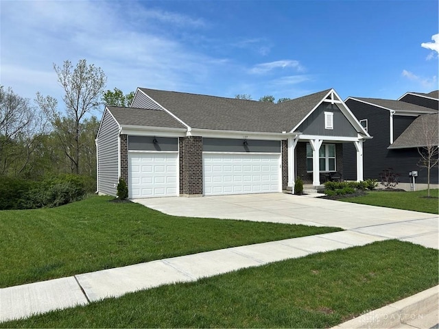 1189 Heathgate Way, Fairborn, OH 45324 - view of front facade with concrete driveway, brick siding, a garage, and a front lawn