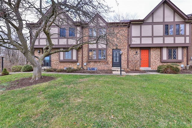 tudor house with a front lawn