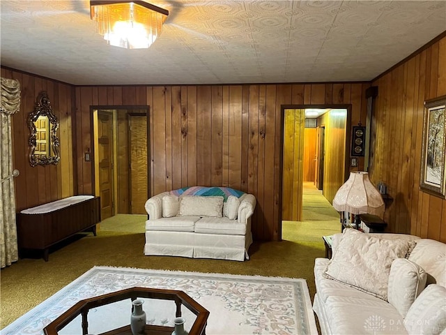 living room featuring carpet flooring and a textured ceiling