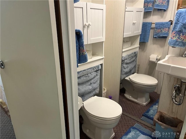 bathroom featuring toilet