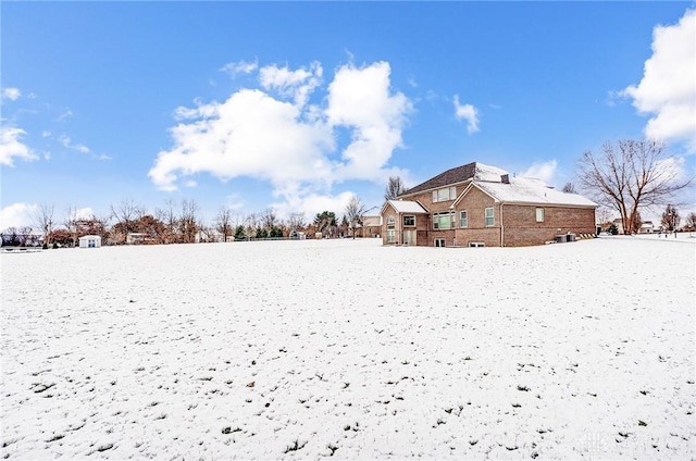 view of yard covered in snow