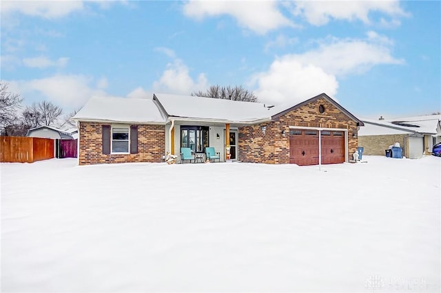 single story home featuring a garage