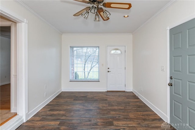 entrance foyer with crown molding, ceiling fan, and dark wood-type flooring