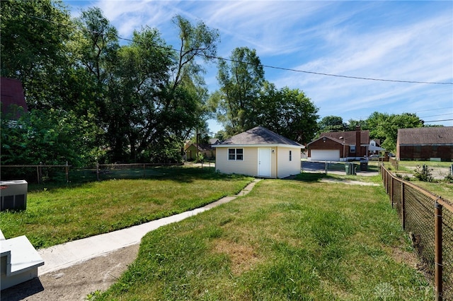 view of yard with an outdoor structure