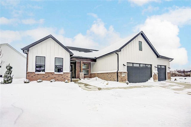 modern farmhouse featuring a garage