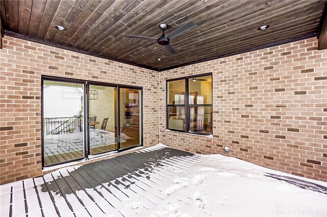 wooden deck with ceiling fan