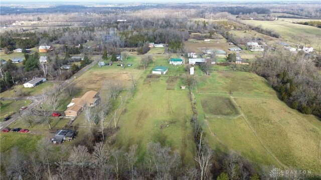 birds eye view of property featuring a rural view