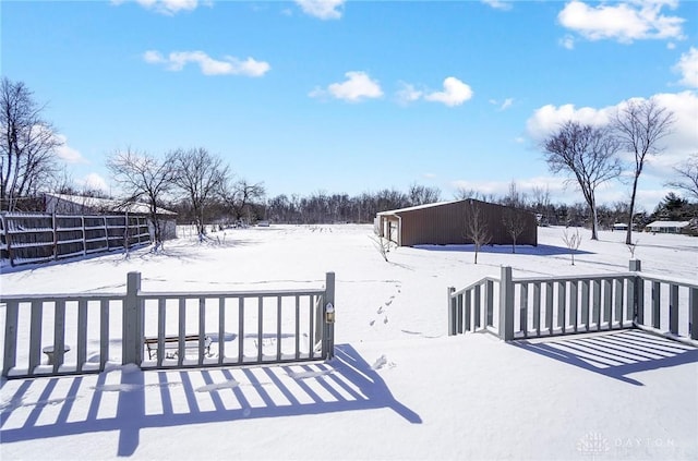 view of yard covered in snow