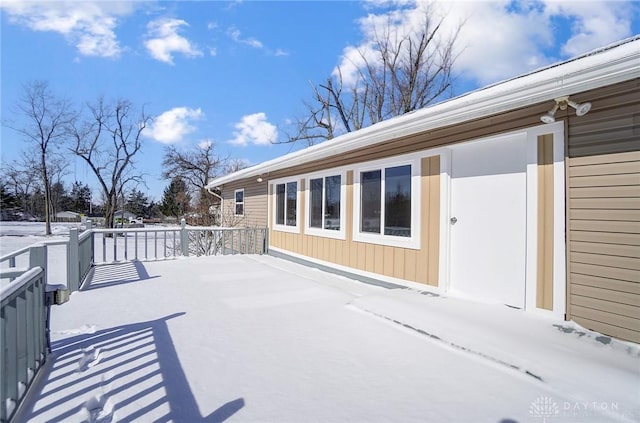 view of snow covered patio