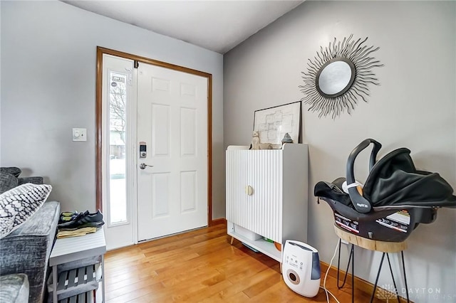 foyer entrance featuring hardwood / wood-style flooring