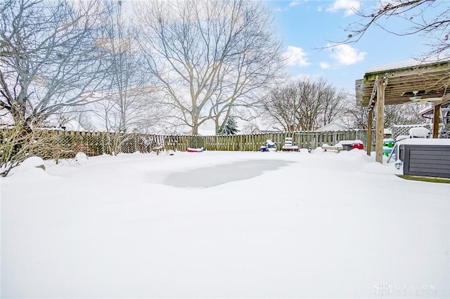 view of yard covered in snow