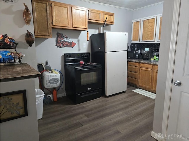 kitchen with backsplash, crown molding, white refrigerator, black electric range, and dark hardwood / wood-style floors